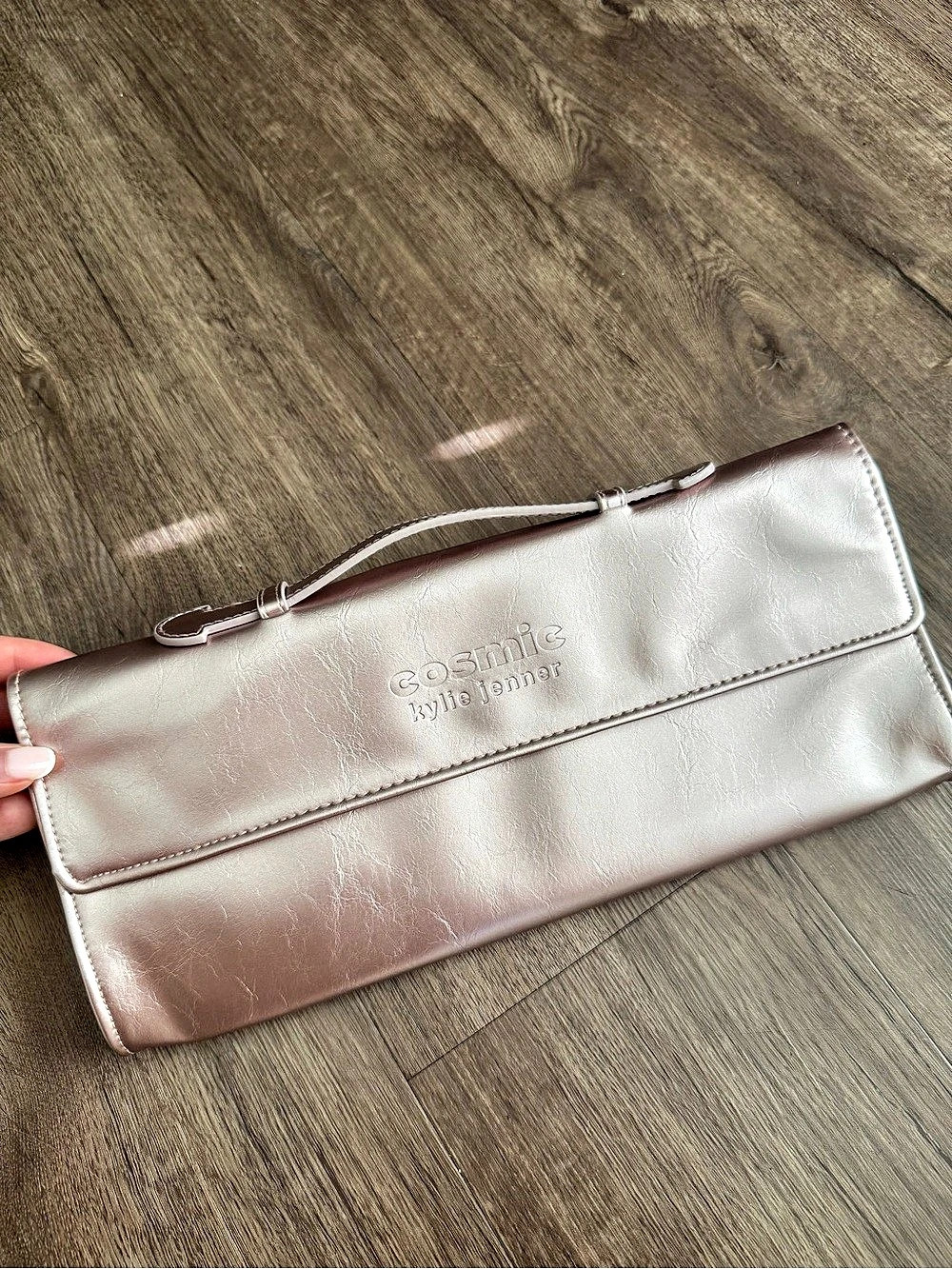 Cosmic metallic pink clutch bag